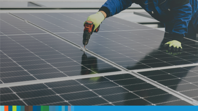An image of a solar panel being installed on the roof of a building